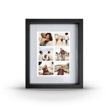 A framed photo album containing six landscape images, with a black frame and a clear glass front.